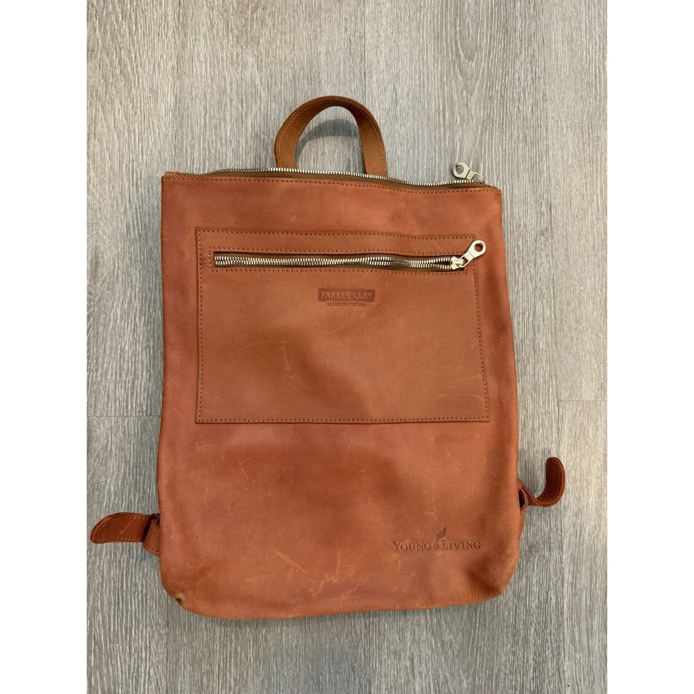 Parker Clay Miramar Leather Women's Backpack Rust Brown Young Living Logo